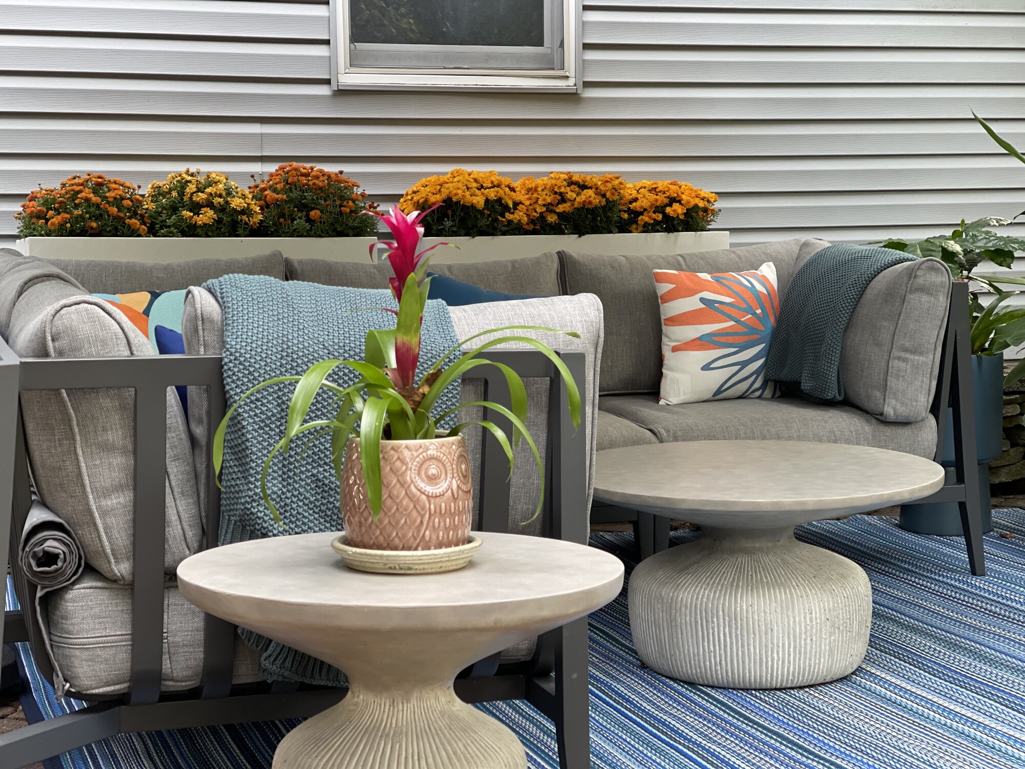 A Mid-Century–Style Patio with Pond Views - Photo 2