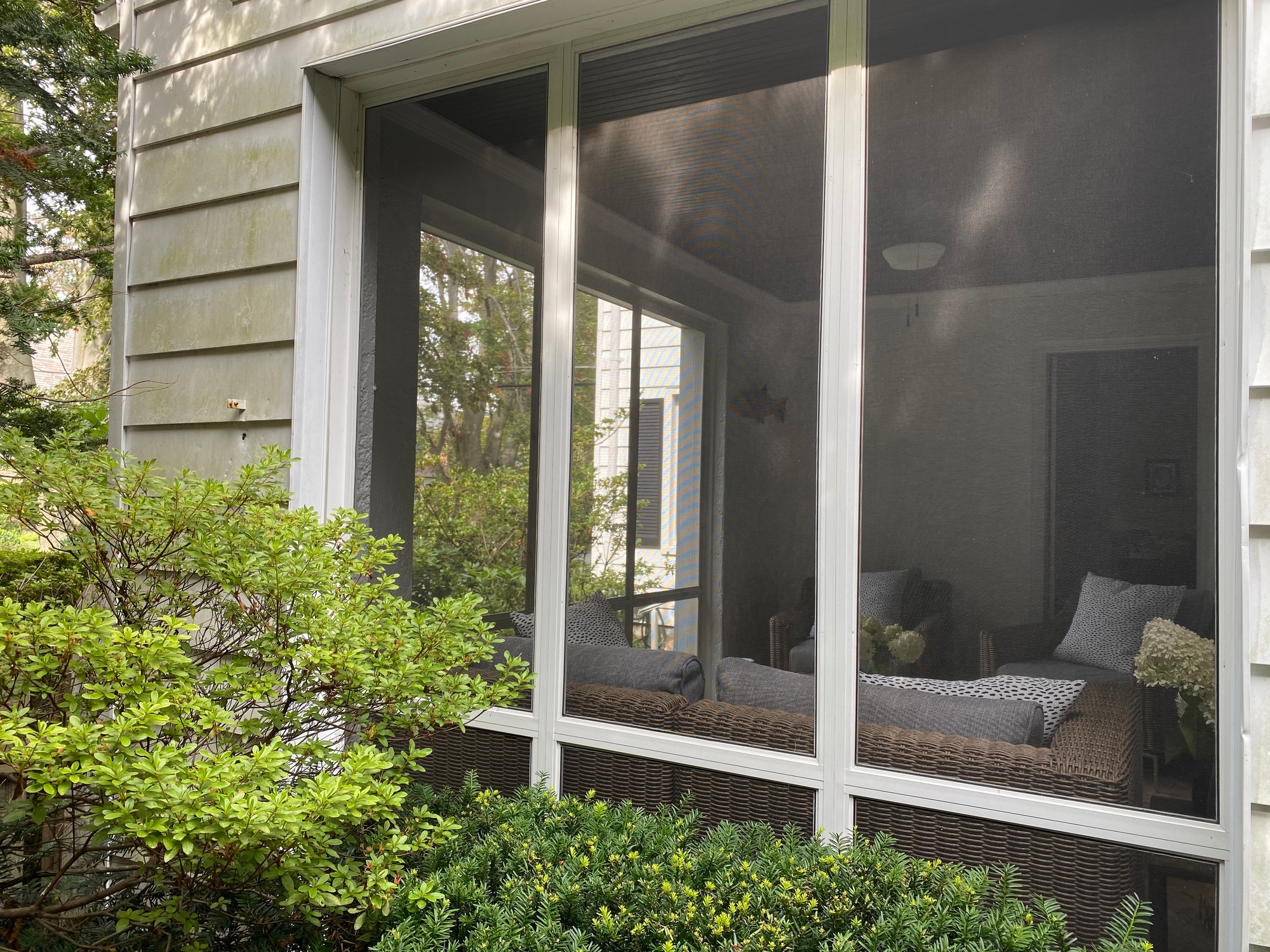 An Inviting Indoor-Outdoor Screened-In Porch - Photo 5