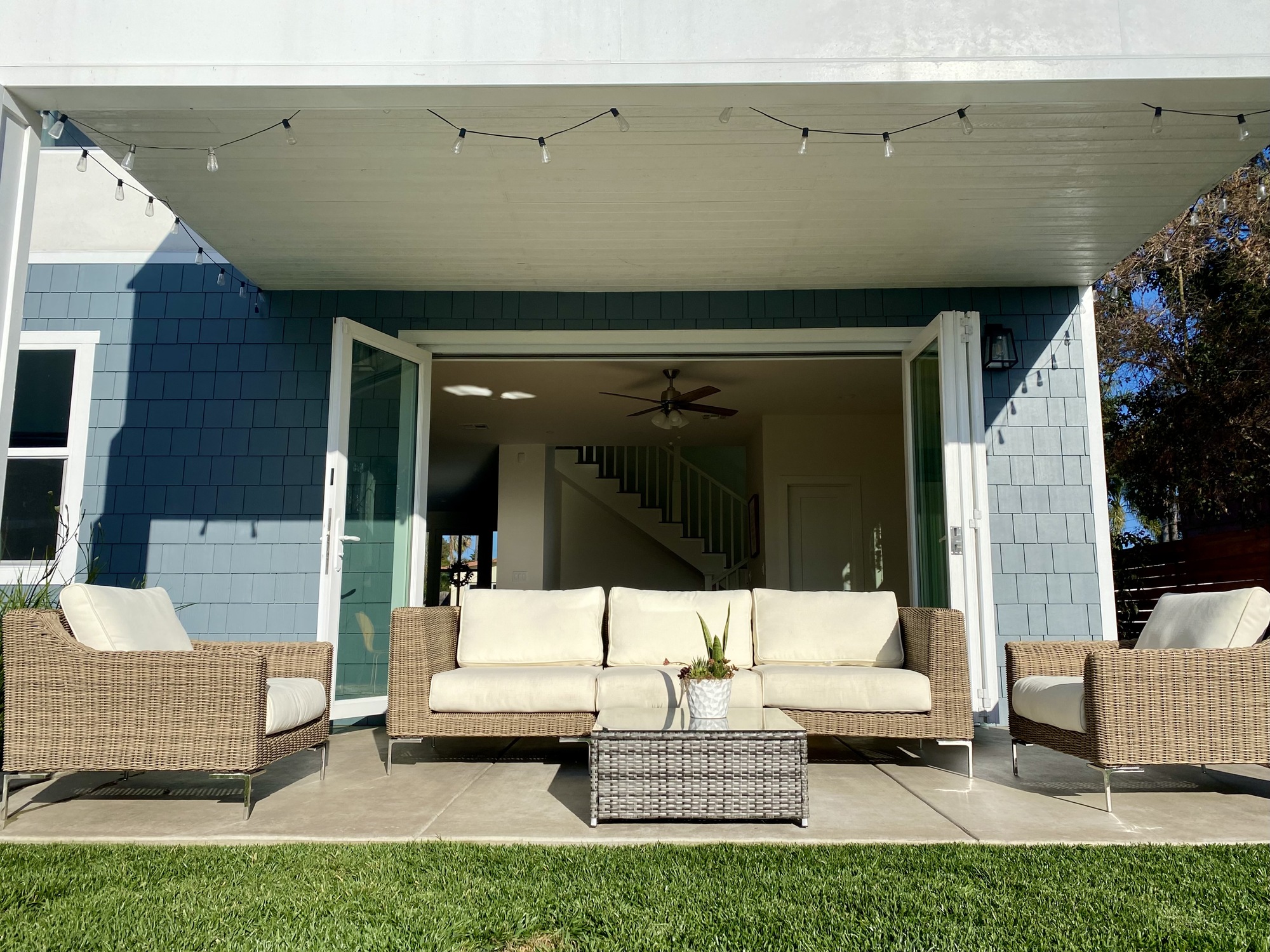 A Modern Beachy Backyard with Covered Patio - Photo 1