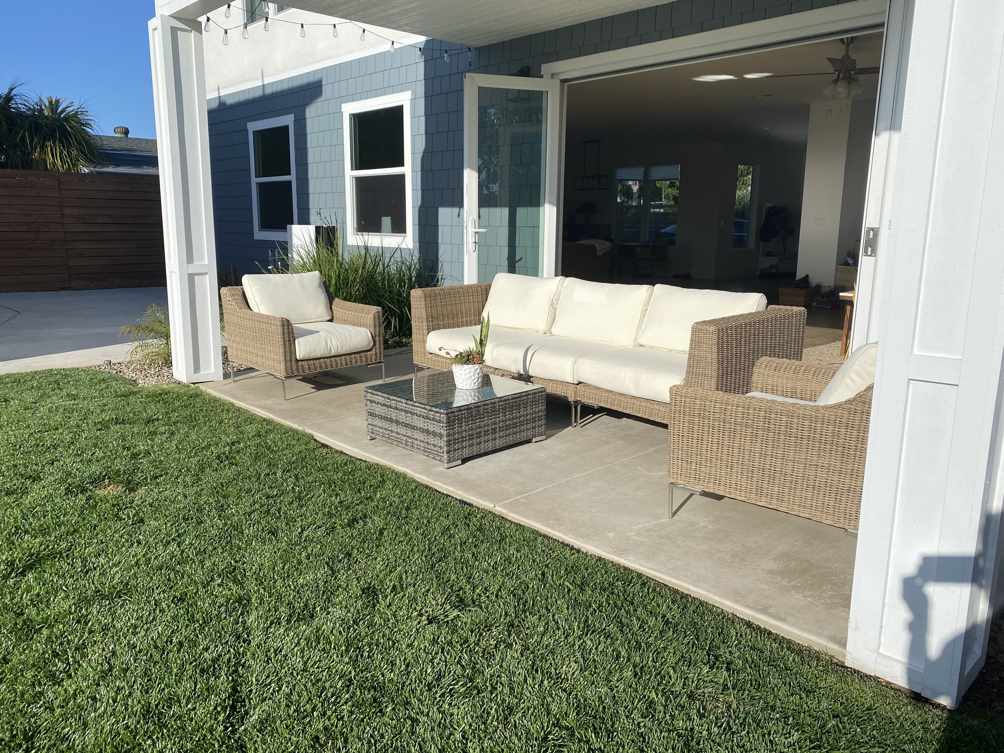 A Modern Beachy Backyard with Covered Patio - Photo 3