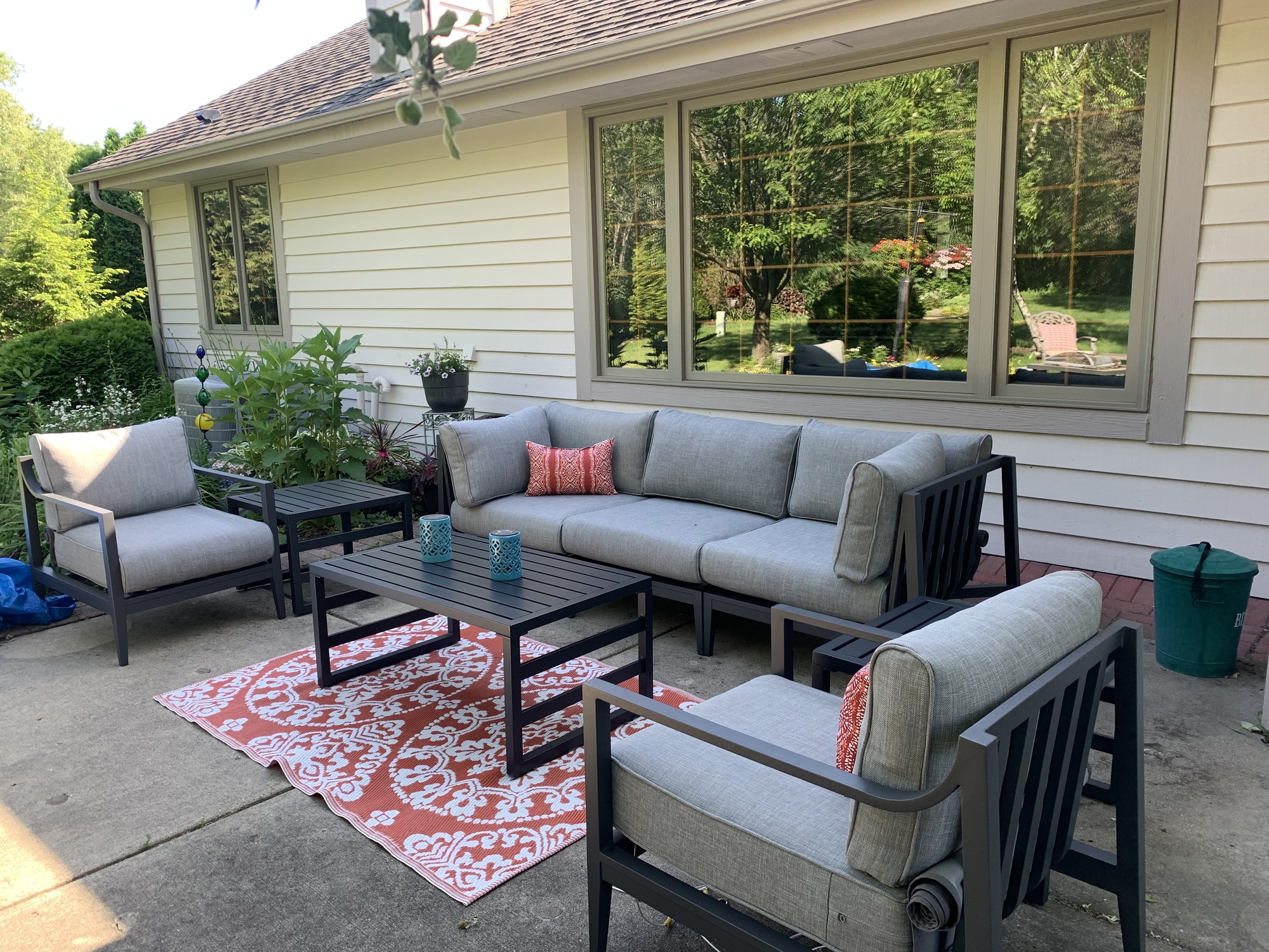 A Backyard Patio Surrounded by Woods - Photo 1